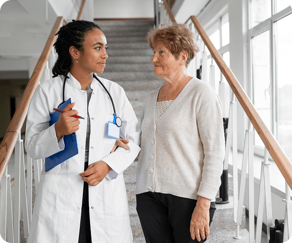 Healthcare professional assisting patient