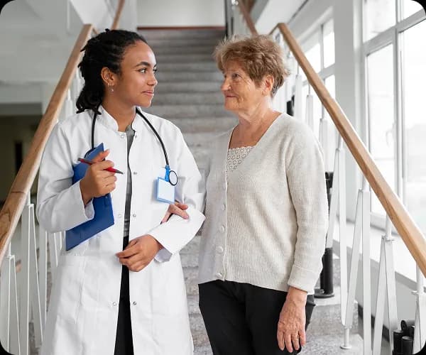 Healthcare professional assisting patient